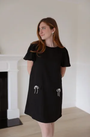 Black dress with bows